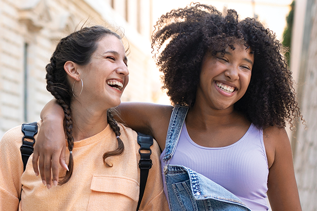 two young women smiling