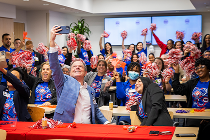 CEO Scott Wester taking selfie with Joe D nurses at Magnet celebration