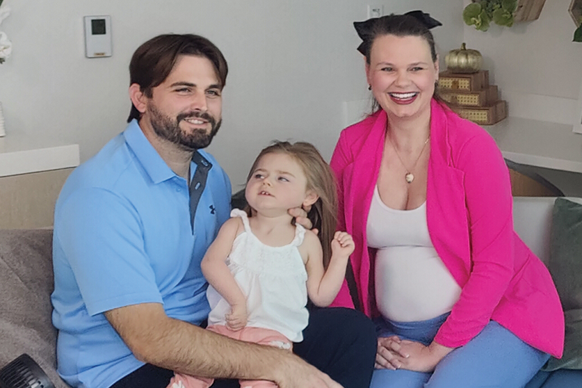 Ellia and her parents, Ryan and Sarah