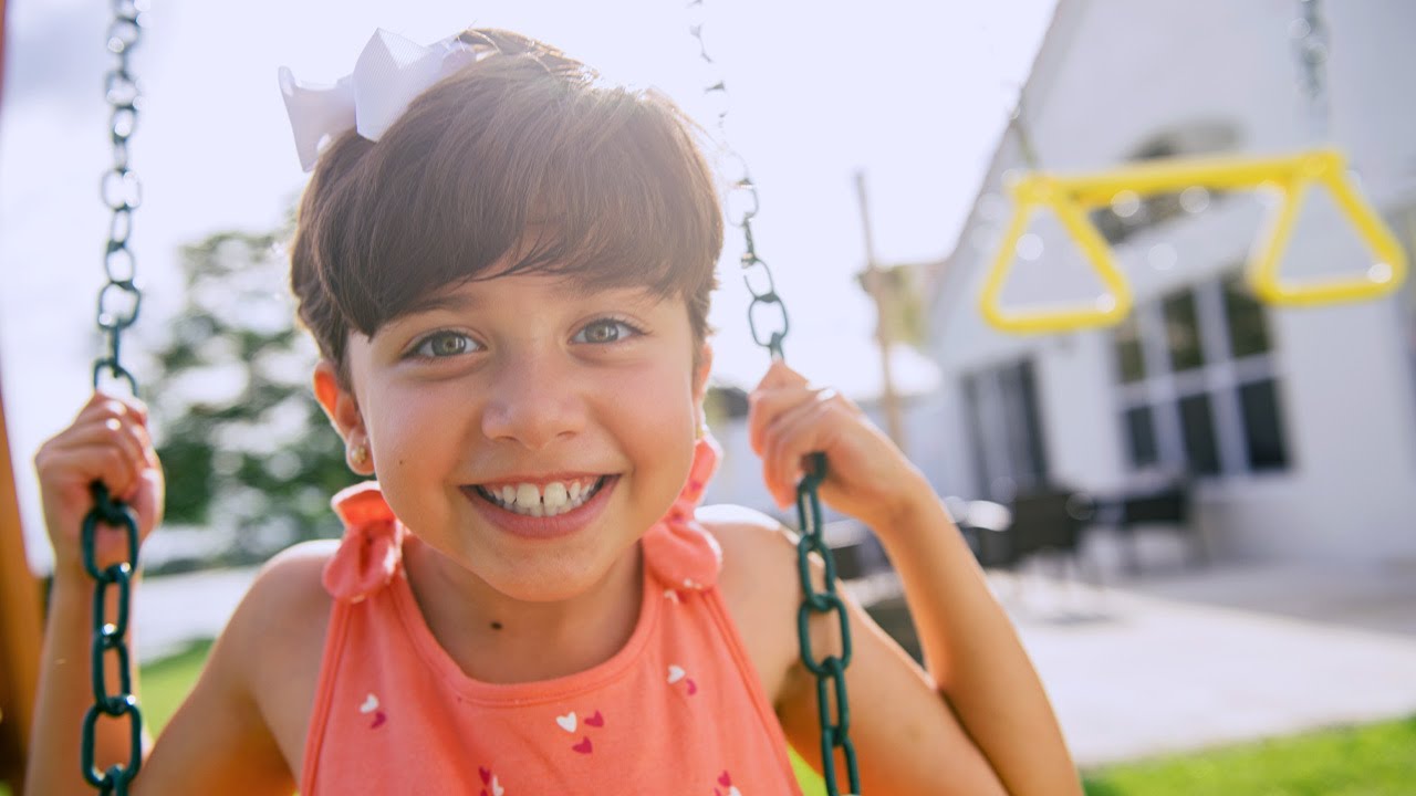Elia Pediatric Oncology patient in a swing