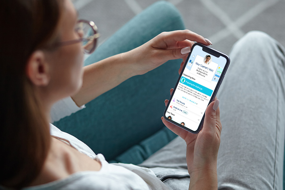Patient looking at MyChart App in her phone
