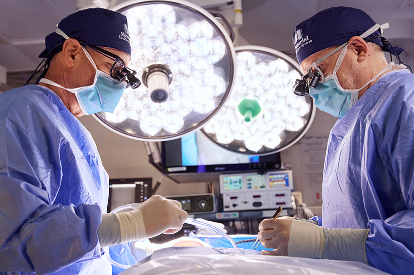 Memorial Healthcare surgeons team performs an operation on a patient at the cardiac surgery clinic