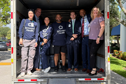 Broward Health employees loading supplies in truck